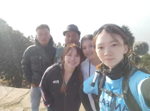 a group of people posing for a photo during trek